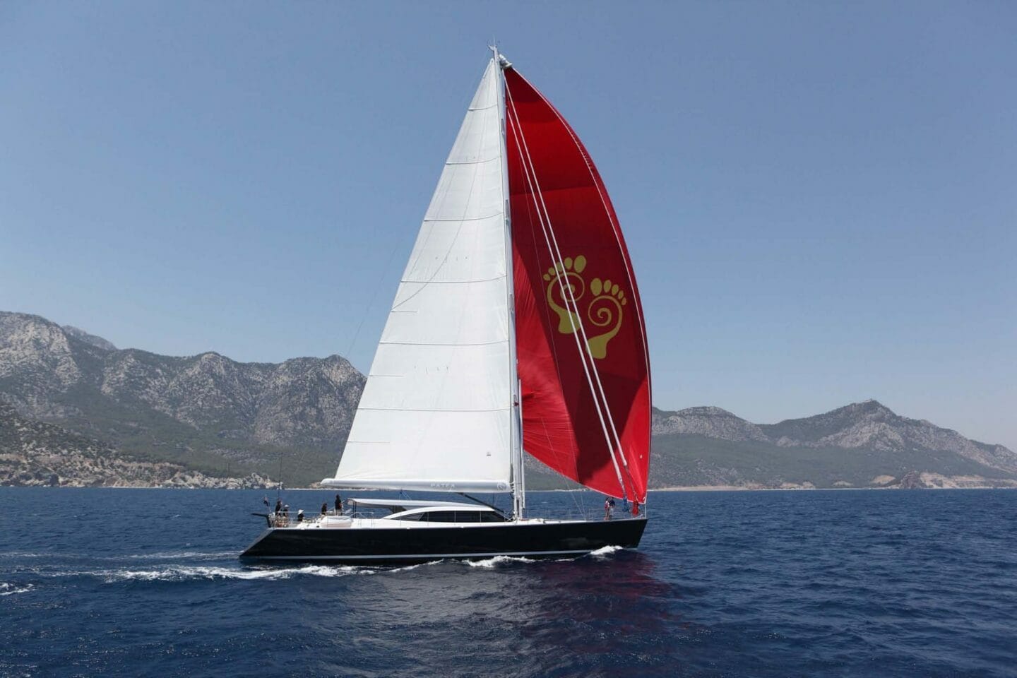 Alia Yachts Patea at sea with red sail