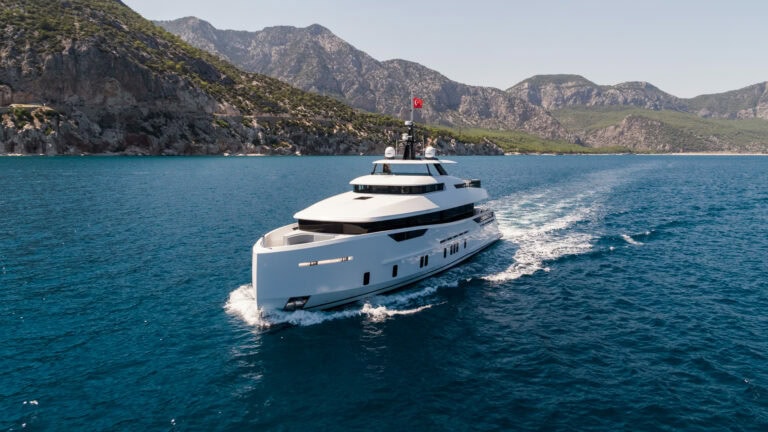 Alia Yachts Virgin Del Mar cruising speed with land in the background