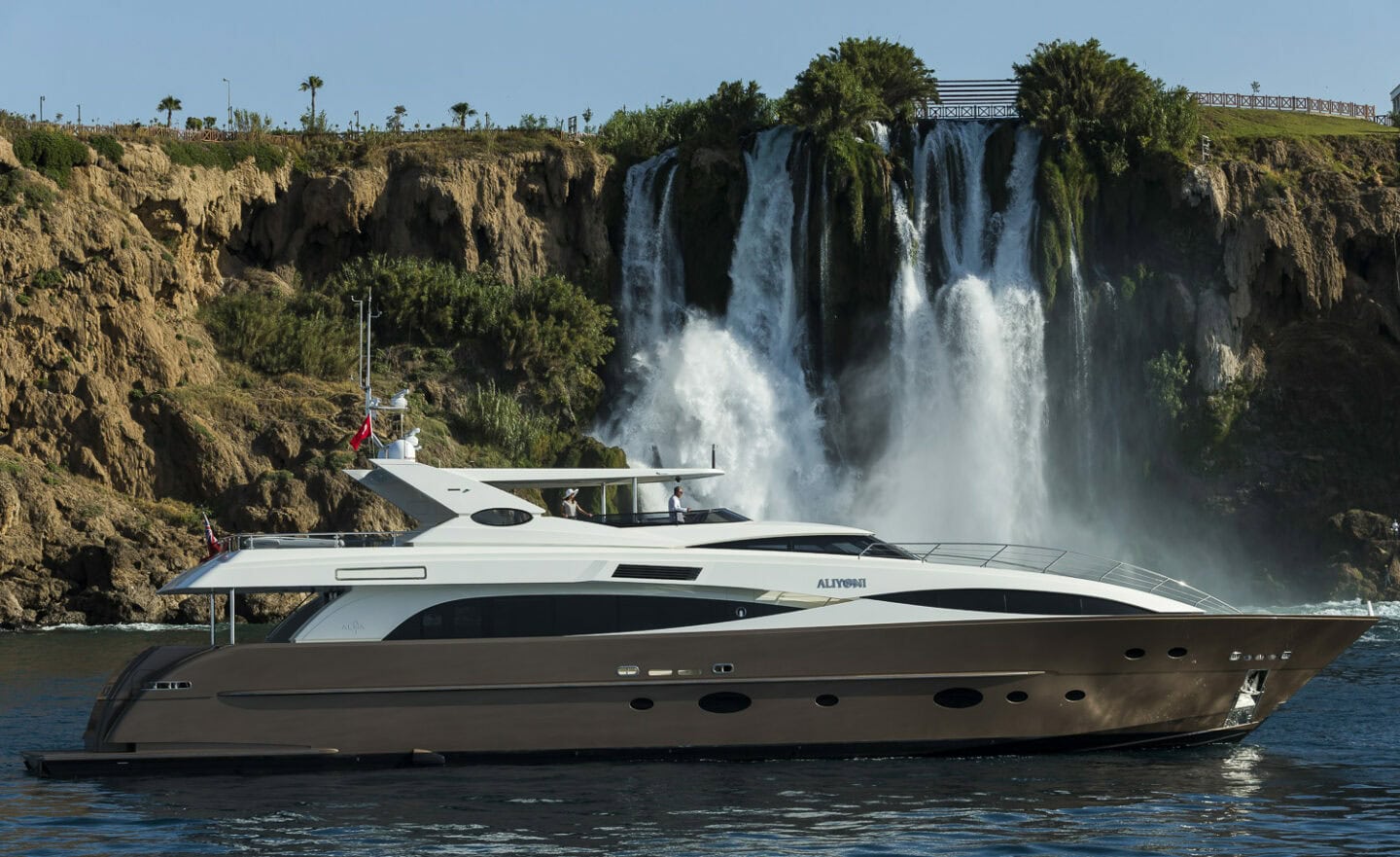 Alia Yachts ALIYONI sin front of a waterfall